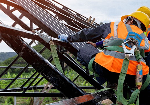 workers replacing an industrial roof