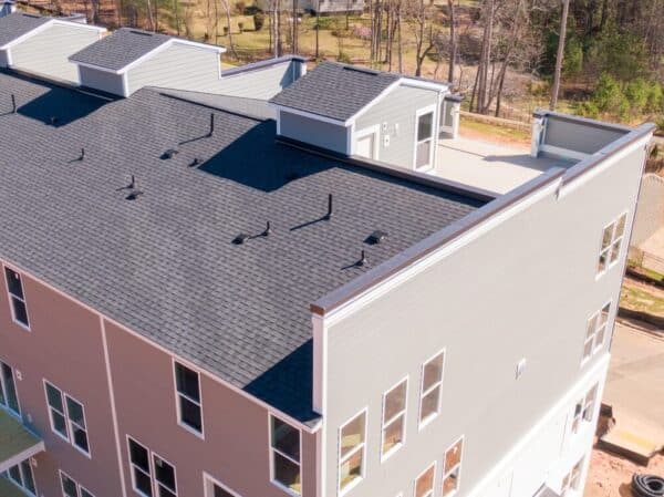 An asphalt shingle roof on an apartment complex roof