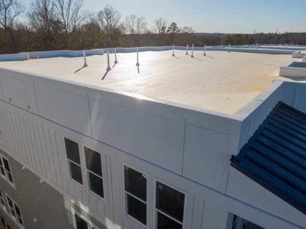 TPO roofing membranes create a durable waterproof layer on flat commercial roofs.